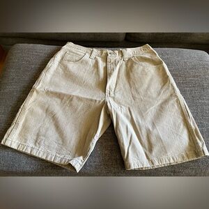 Brand New men’s Wrangler carpenter shorts tan size 36 loose fit hits the knee.